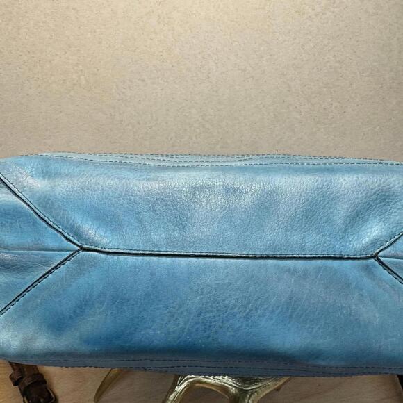Moda Luxe Washed Blue Leather Hobo Shoulder Bag with Braiding and Tassel Accents